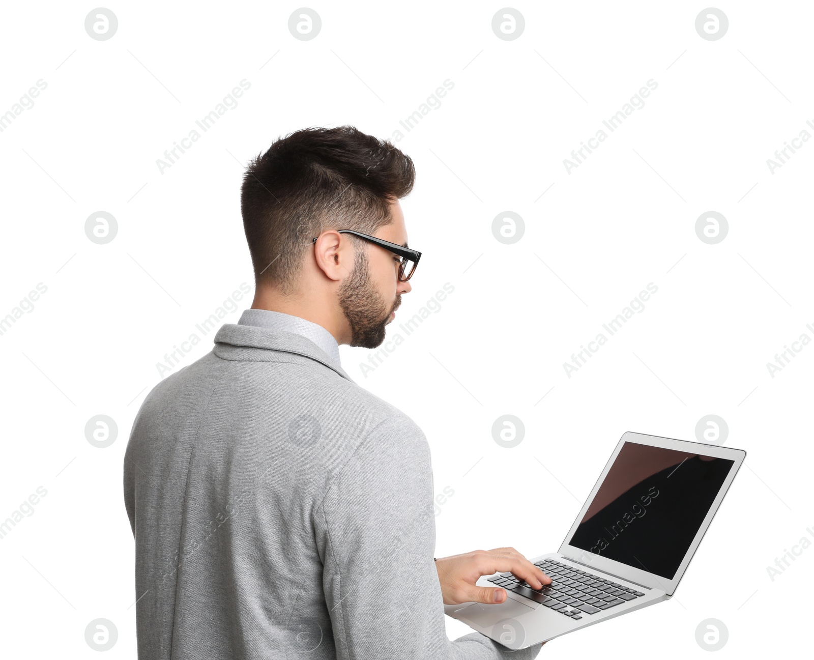 Photo of Young businessman with laptop on white background