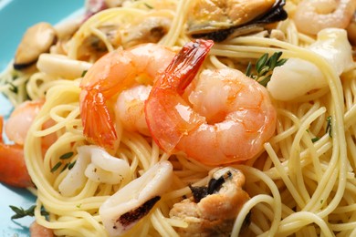 Delicious pasta with sea food, closeup view