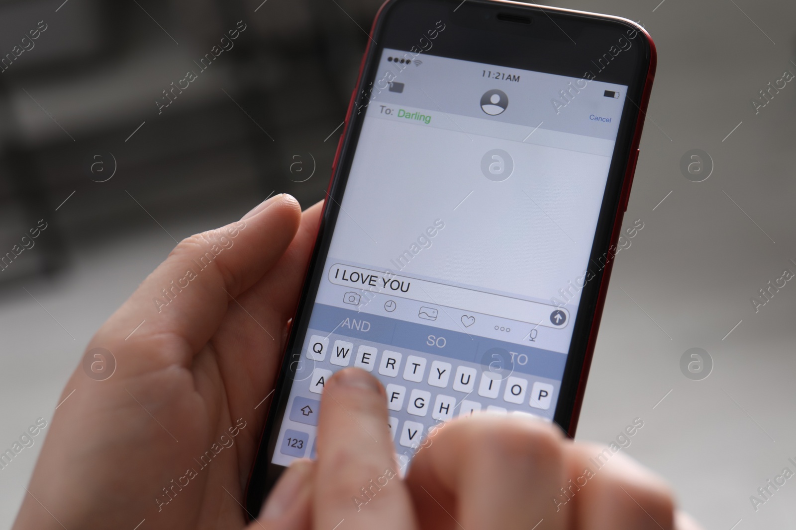 Photo of Woman sending message with text I Love You indoors, closeup