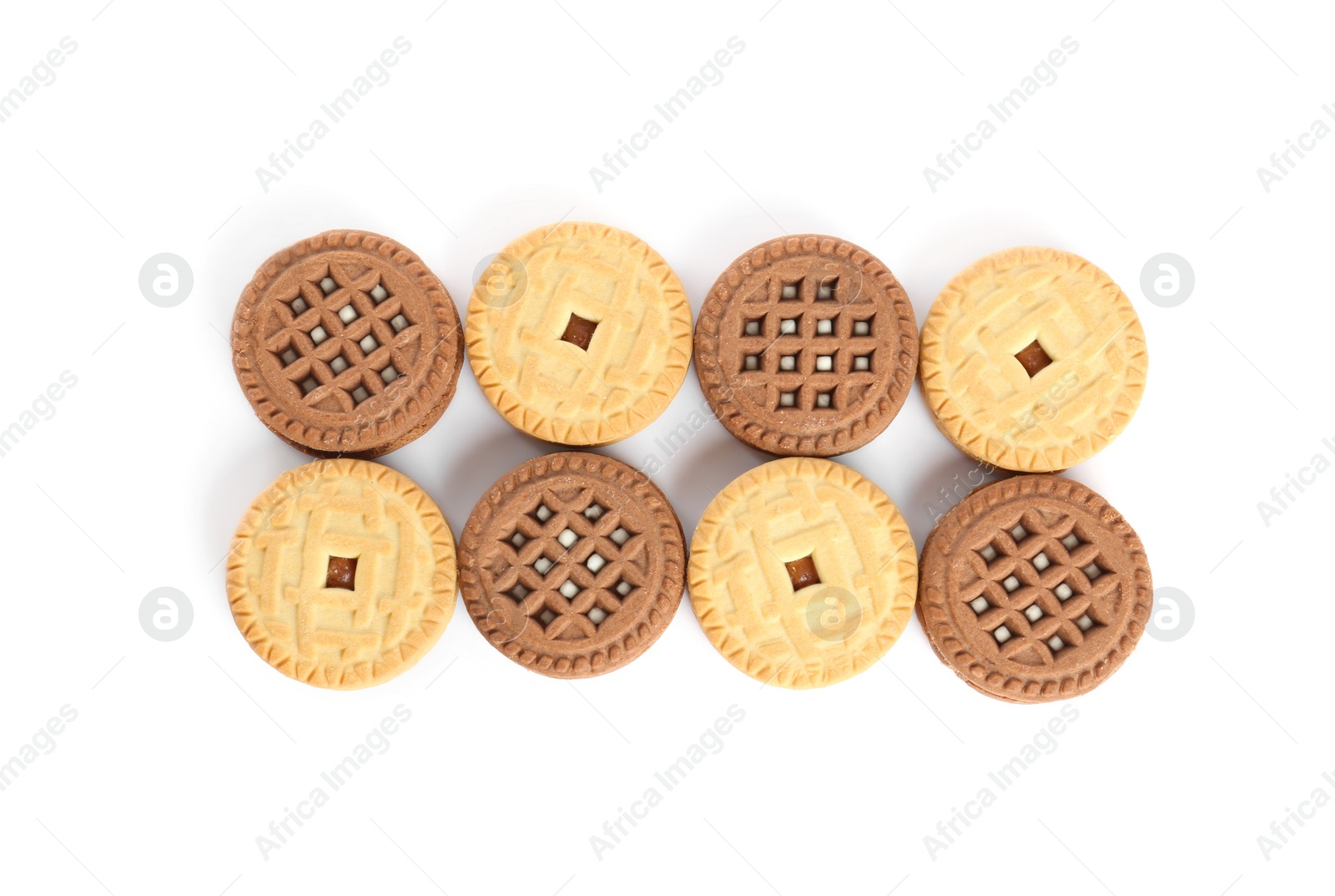 Photo of Different tasty sandwich cookies on white background, top view