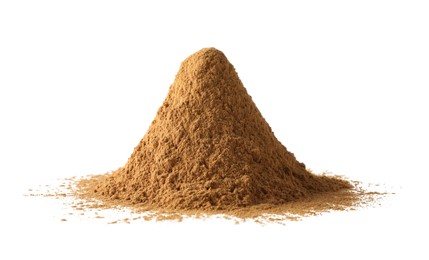 Photo of Pile of dry aromatic cinnamon powder isolated on white