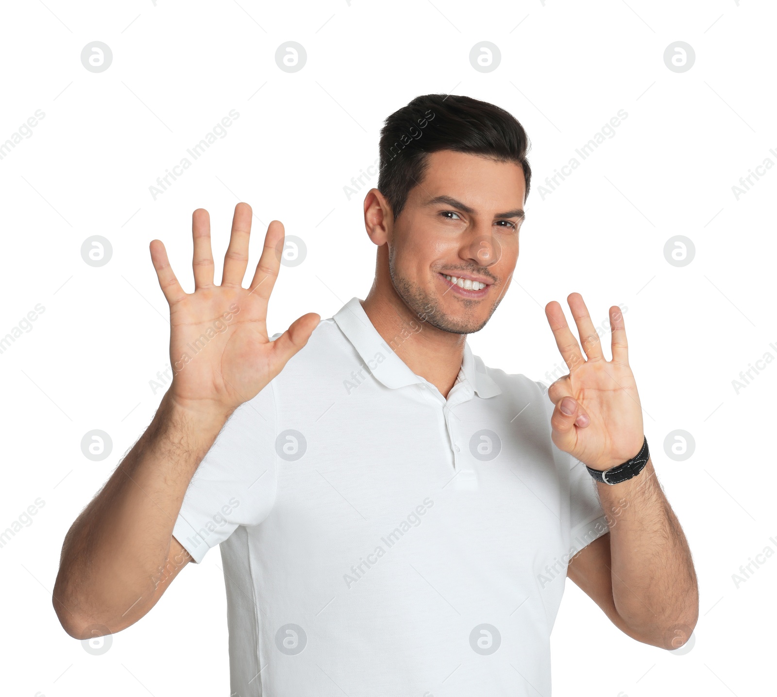 Photo of Man showing number eight with his hands on white background