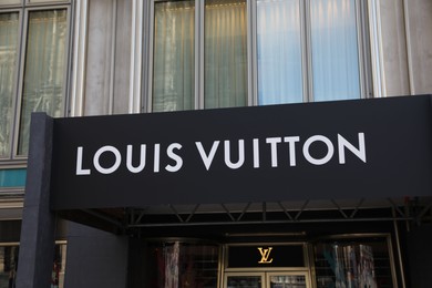 Cologne, Germany - August 28, 2022: Entrance of Louis Vuitton fashion store outdoors