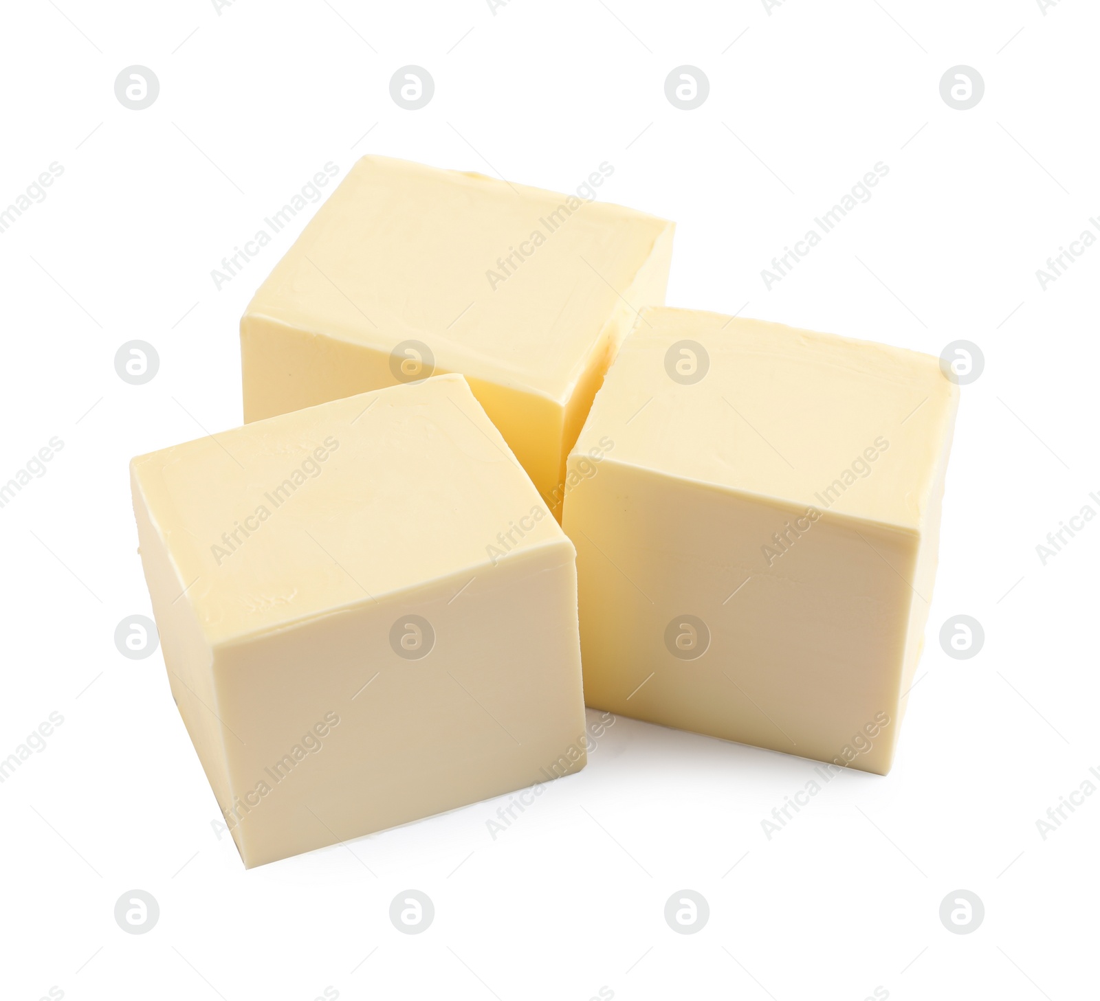 Photo of Cut butter on white background. Dairy product