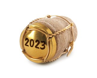 Image of Cork of sparkling wine and muselet cap with engraving 2023 on white background
