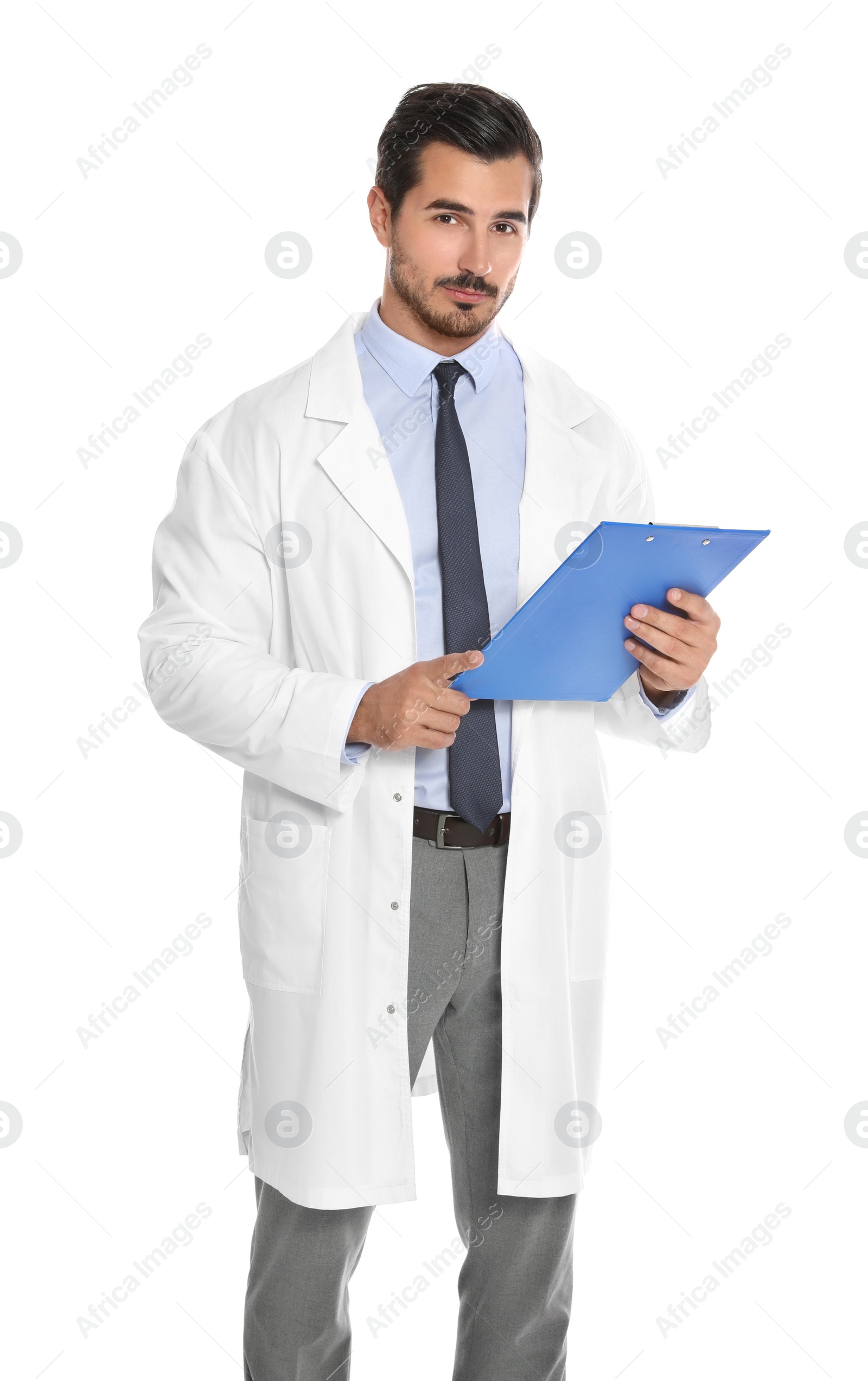 Photo of Young male doctor with clipboard on white background. Medical service