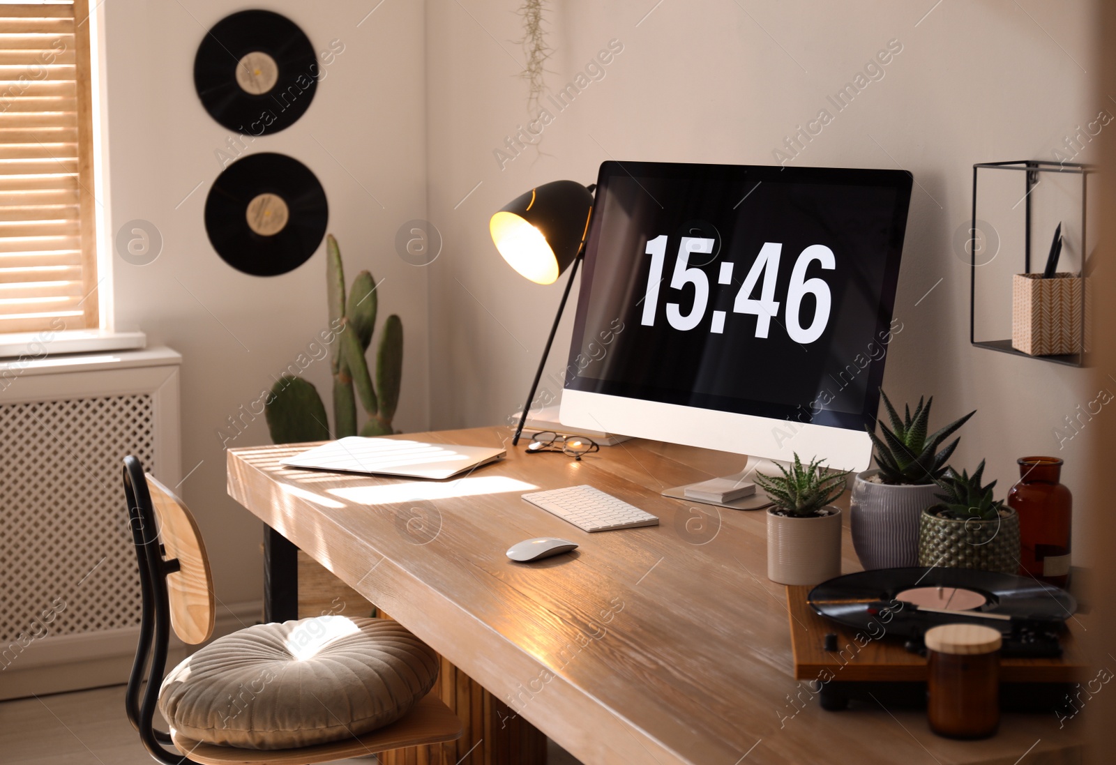 Photo of Room interior with comfortable workplace. Modern computer on wooden desk