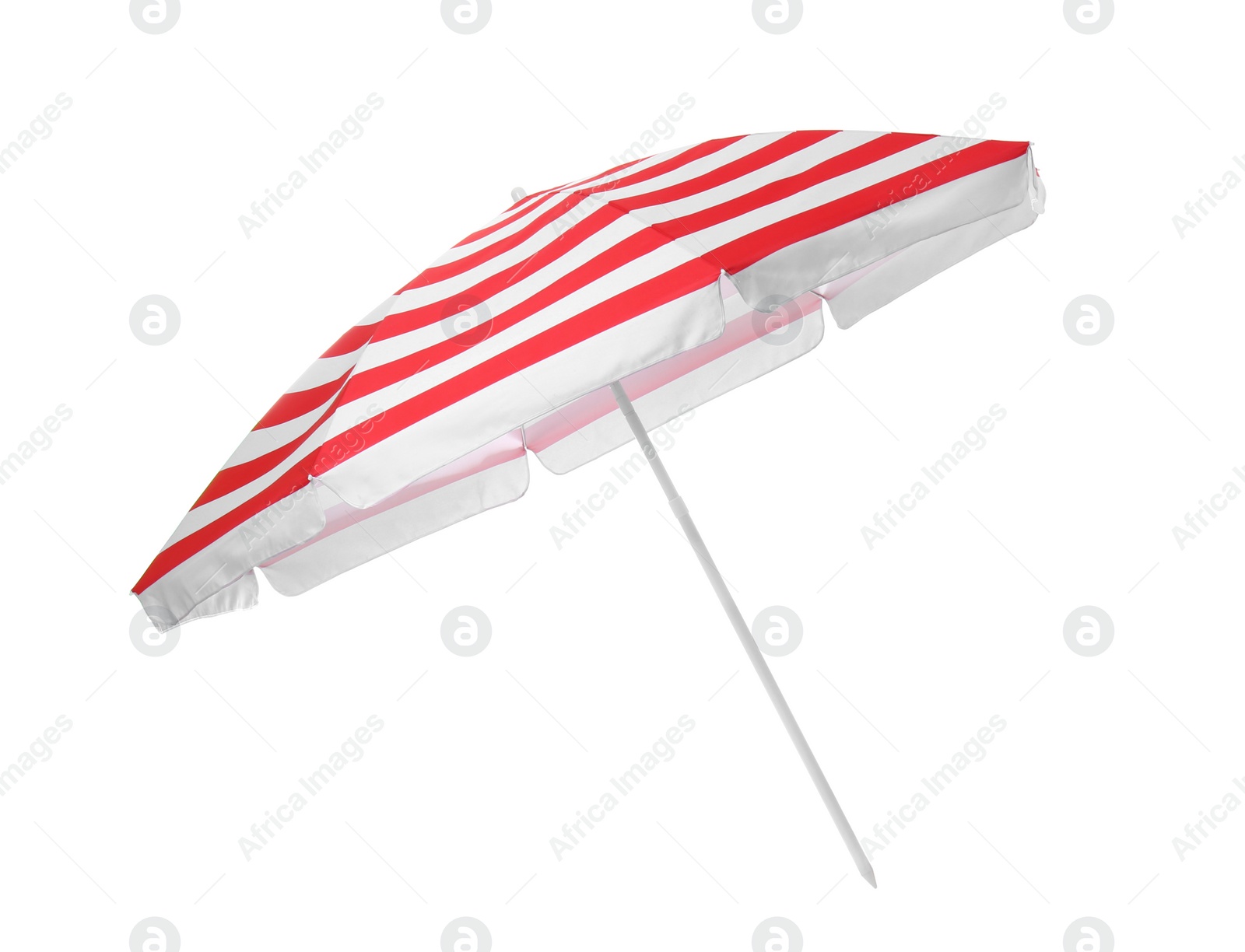 Photo of Open red striped beach umbrella isolated on white