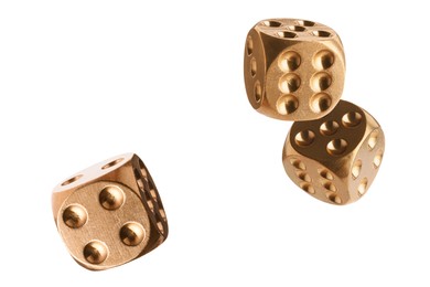 Three golden dice in air on white background