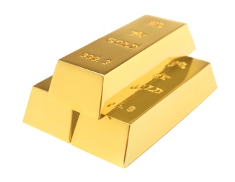 Photo of Precious shiny gold bars on white background