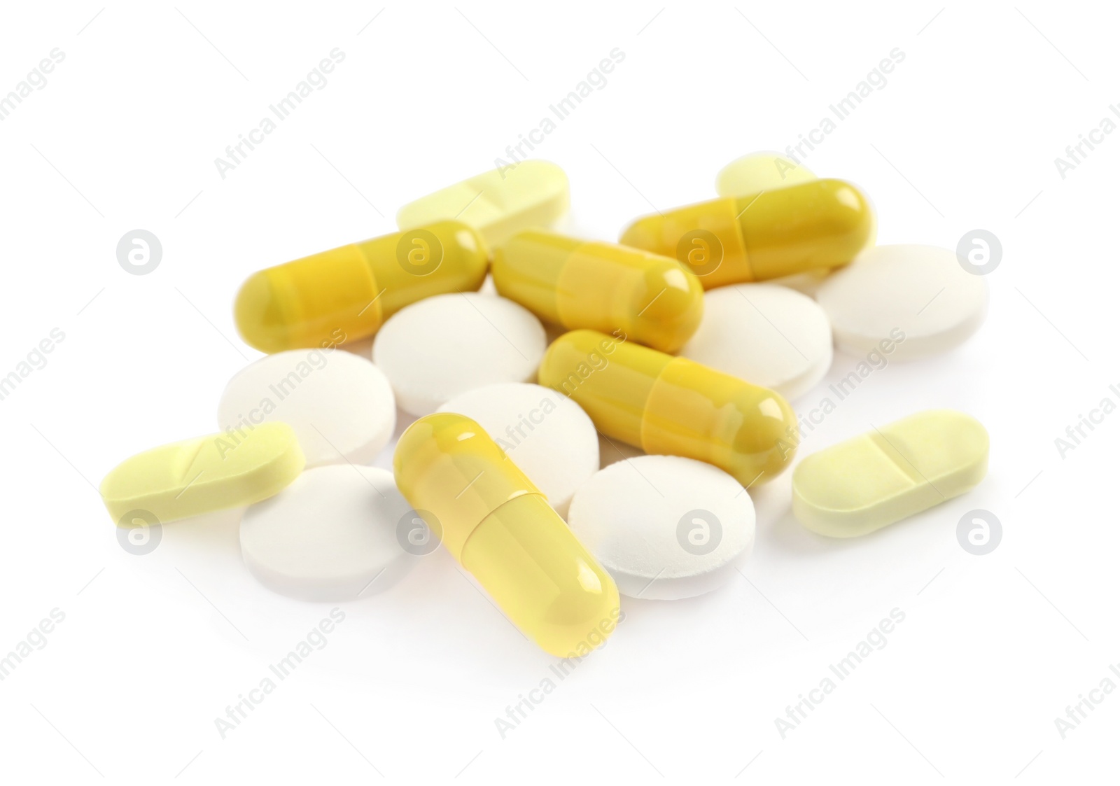 Photo of Many different pills isolated on white. Medicinal treatment