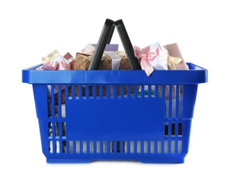 Blue shopping basket with different gifts on white background