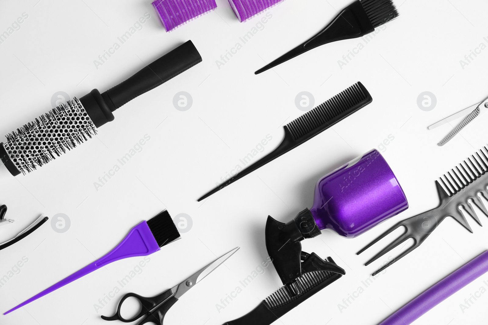 Photo of Professional hairdresser tools on white background