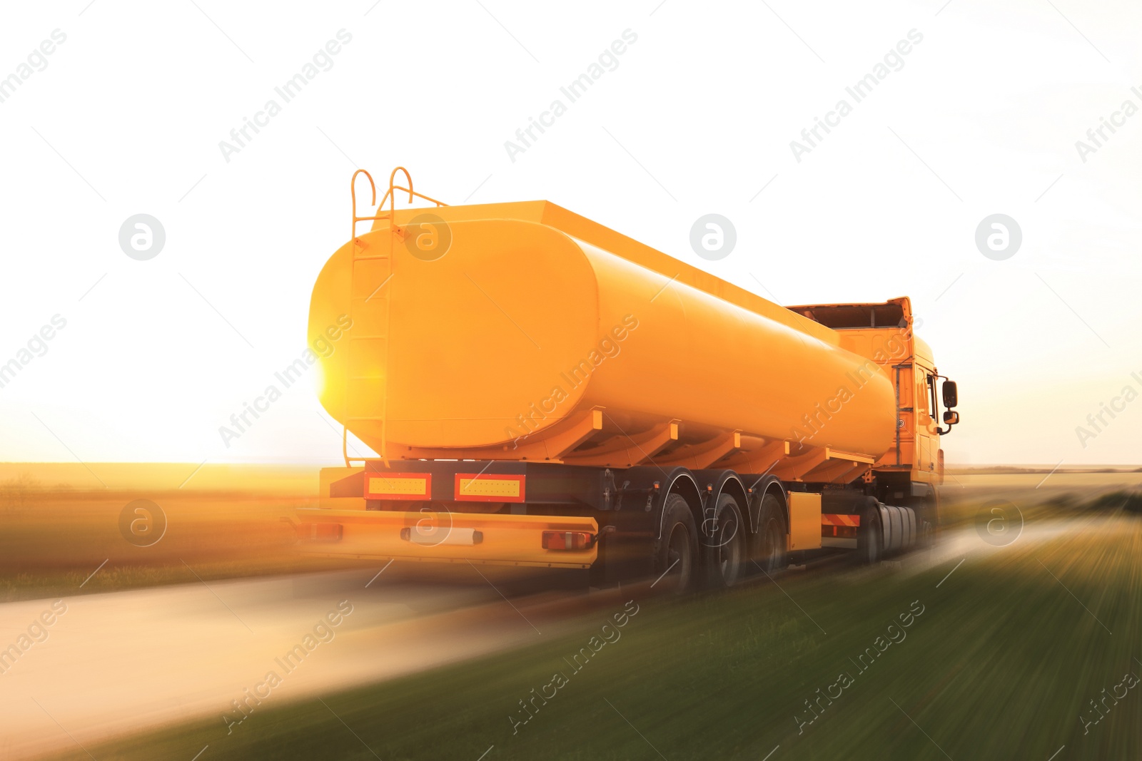 Image of Logistics concept. Truck on country road, motion blur effect 