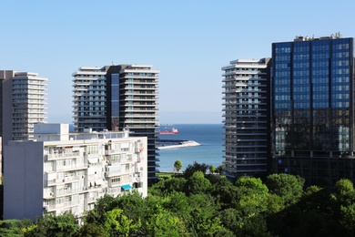 Photo of Picturesque view of city with beautiful buildings near sea