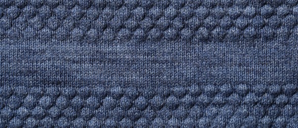 Photo of Texture of soft blue fabric as background, top view