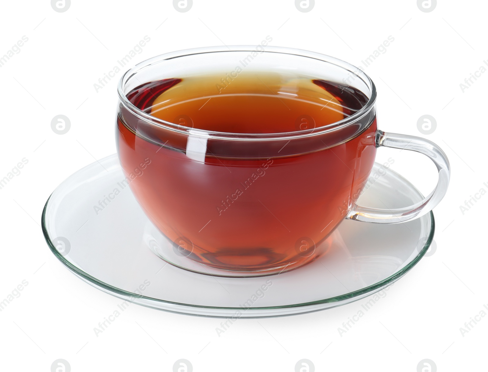 Photo of Aromatic tea in glass cup isolated on white