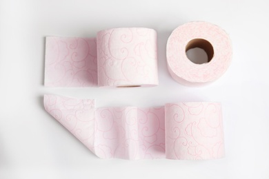 Photo of Toilet paper rolls on white background, top view