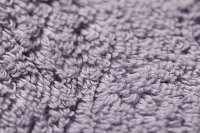 Photo of Texture of soft violet fabric as background, closeup