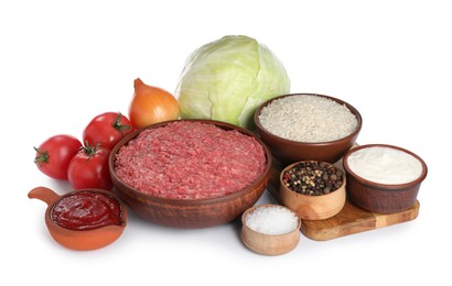 Photo of Set of ingredients for stuffed cabbage rolls on white background