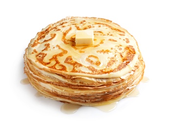 Photo of Stack of thin pancakes with butter on white background