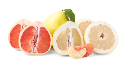 Cut and whole fresh pomelo fruits on white background