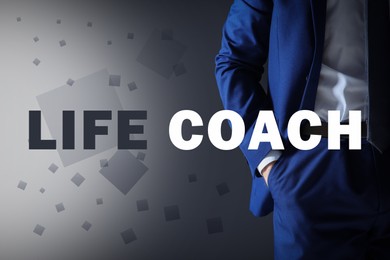 Image of Personal development concept. Businessman and phrase Life Coach on grey background, closeup