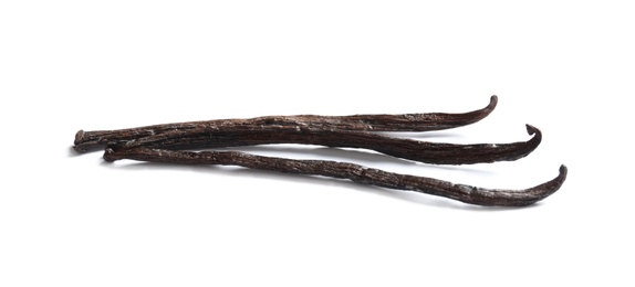 Photo of Aromatic vanilla sticks on white background