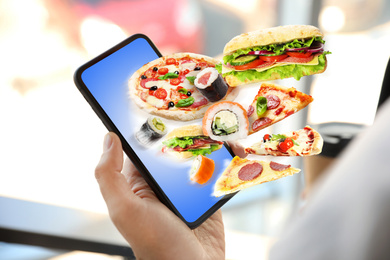 Image of Man using smartphone for ordering food online, closeup. Delivery service during quarantine