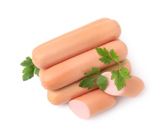 Photo of Whole and cut delicious boiled sausages with parsley on white background, top view