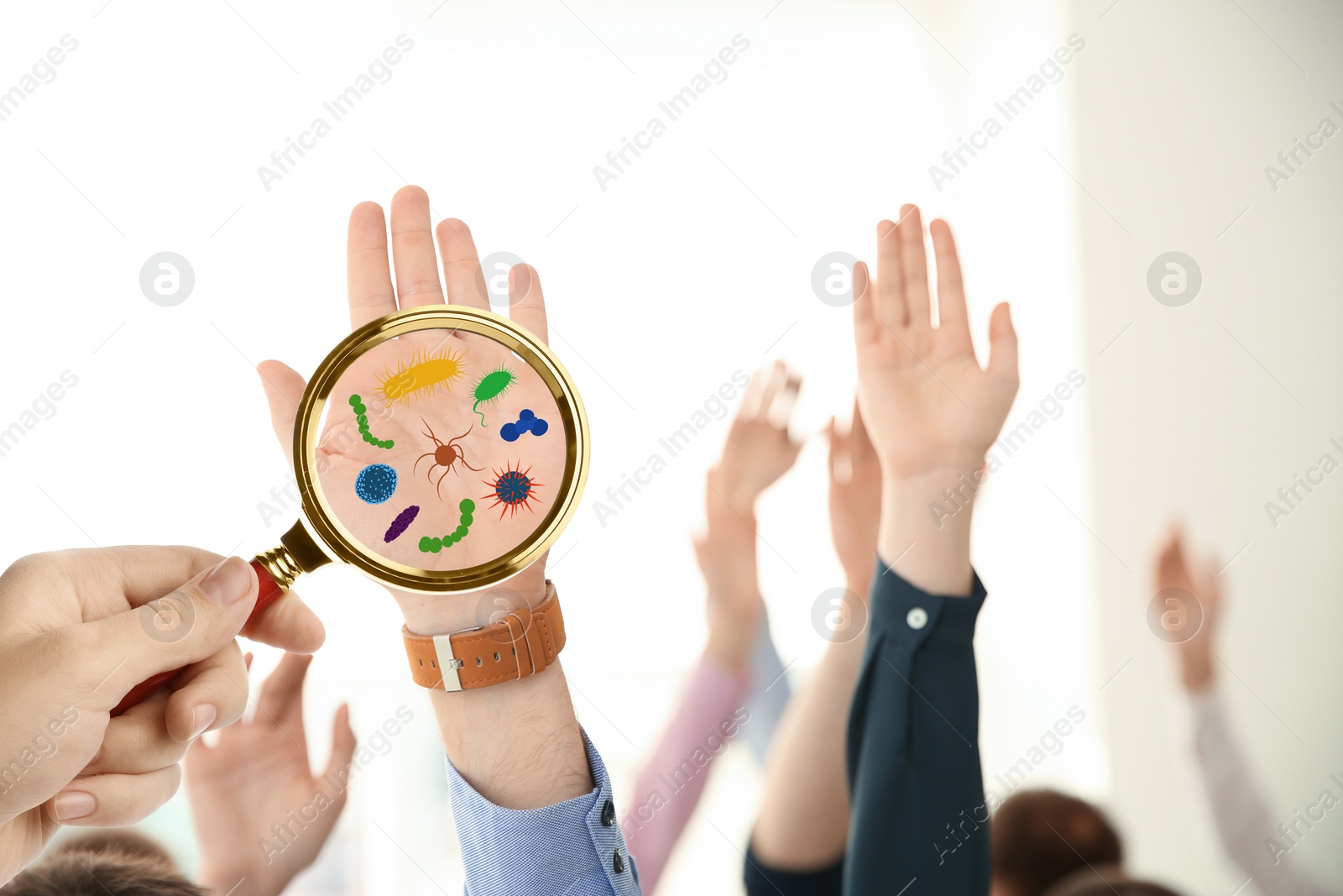 Image of Woman detecting bacteria with magnifying glass indoors, closeup. Prevention disease