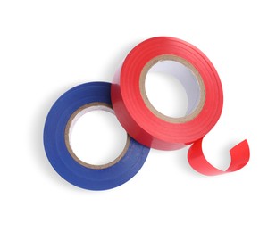 Photo of Colorful insulating tapes on white background, top view