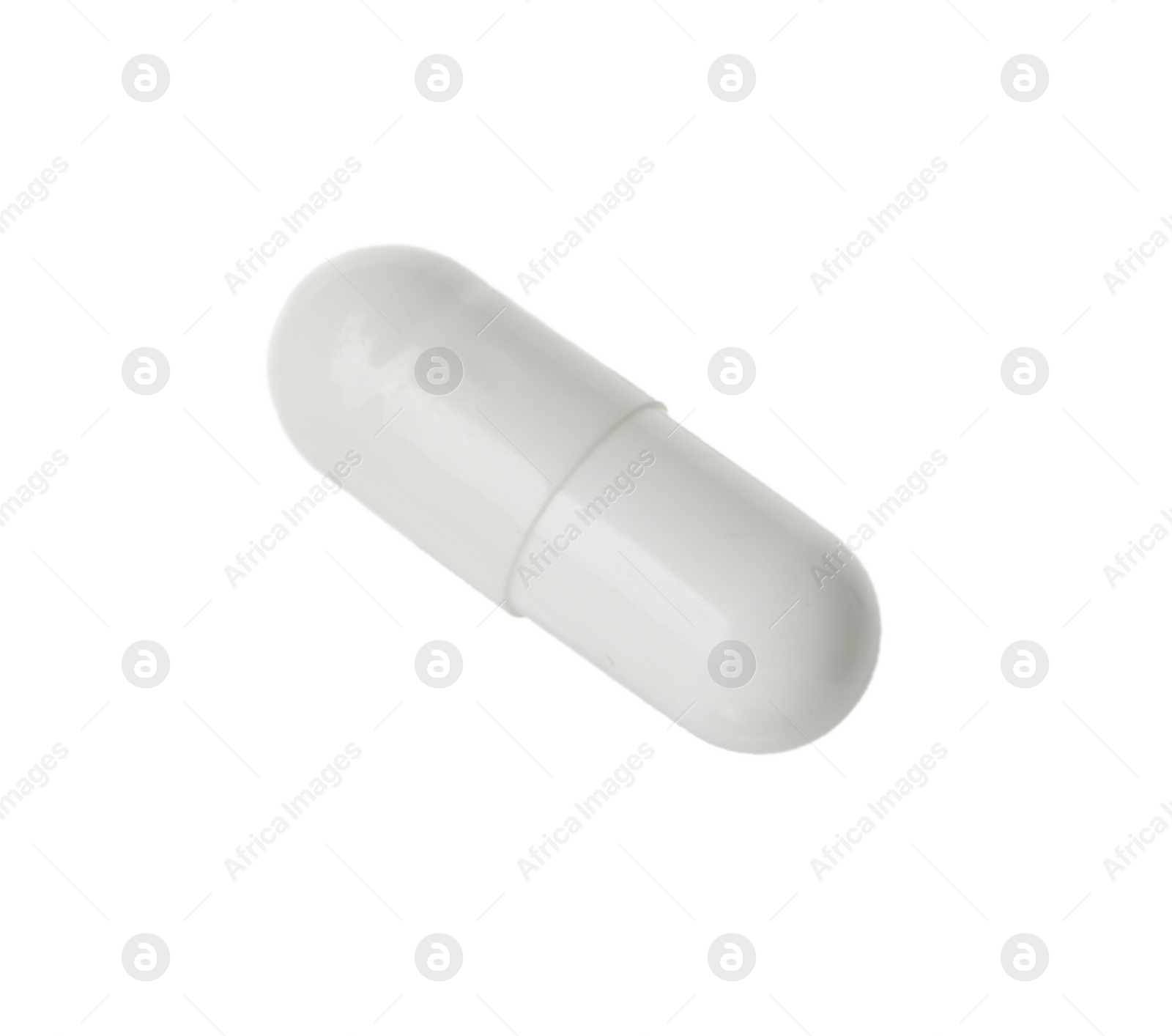 Photo of One vitamin capsule isolated on white. Health supplement