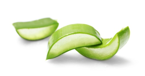 Slices of aloe vera on white background, closeup