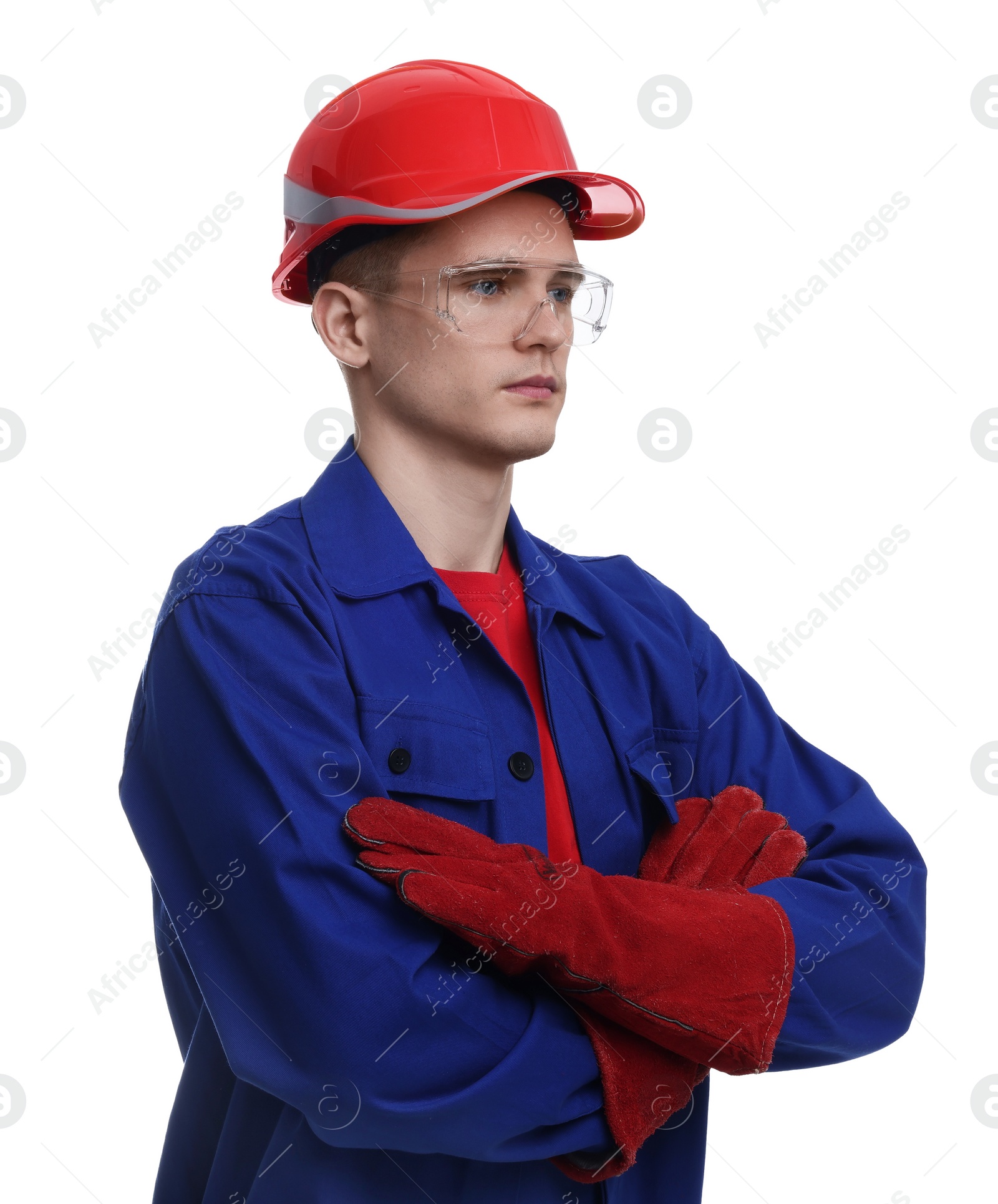 Photo of Young man with crossed arms wearing safety equipment on white background