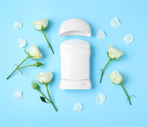 Photo of Flat lay composition with natural female deodorant on light blue background