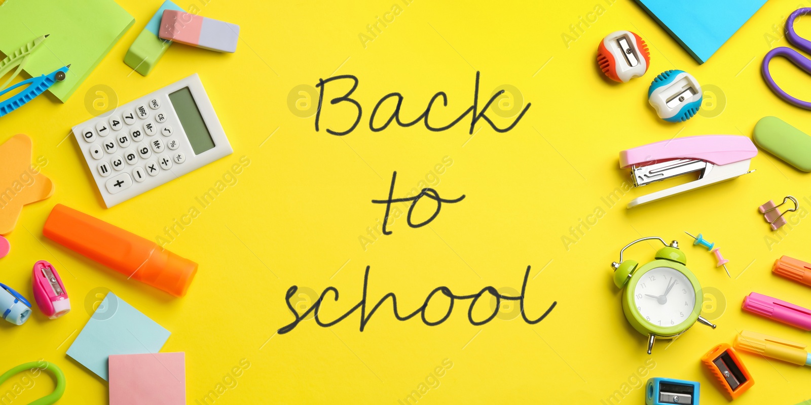 Image of Text Back To School and different stationery on yellow background, flat lay. Banner design 