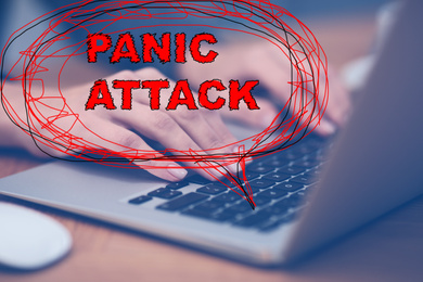 Image of Woman working with laptop, closeup. Use information safely to avoid panic attack