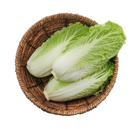 Photo of Fresh tasty Chinese cabbages in wicker basket on white background, top view