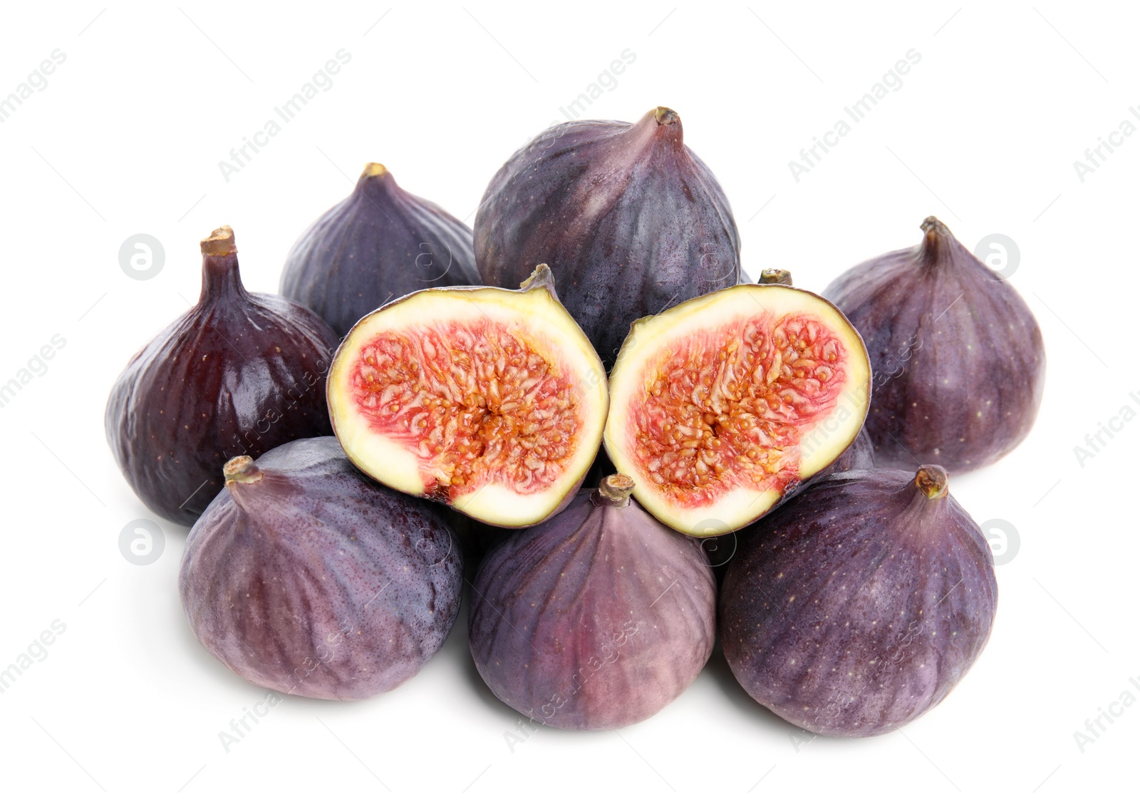 Photo of Whole and cut fresh ripe figs isolated on white