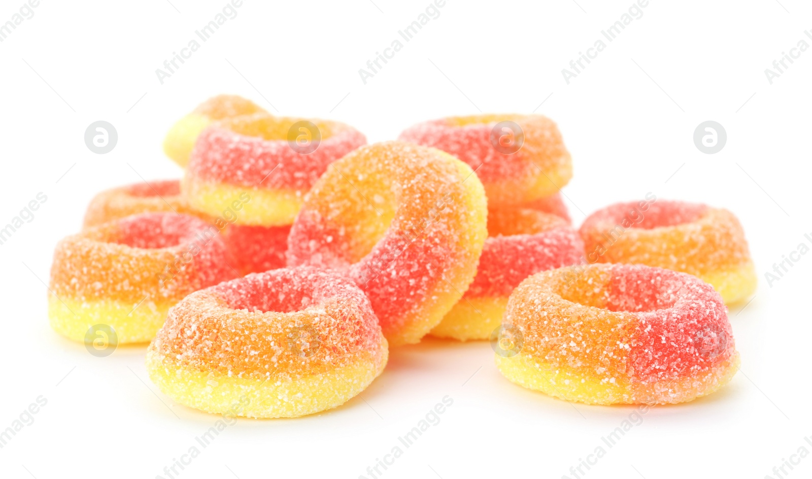 Photo of Pile of delicious jelly candies on white background