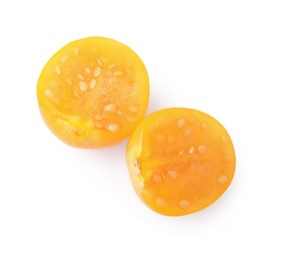 Photo of Cut ripe orange physalis fruit isolated on white, top view