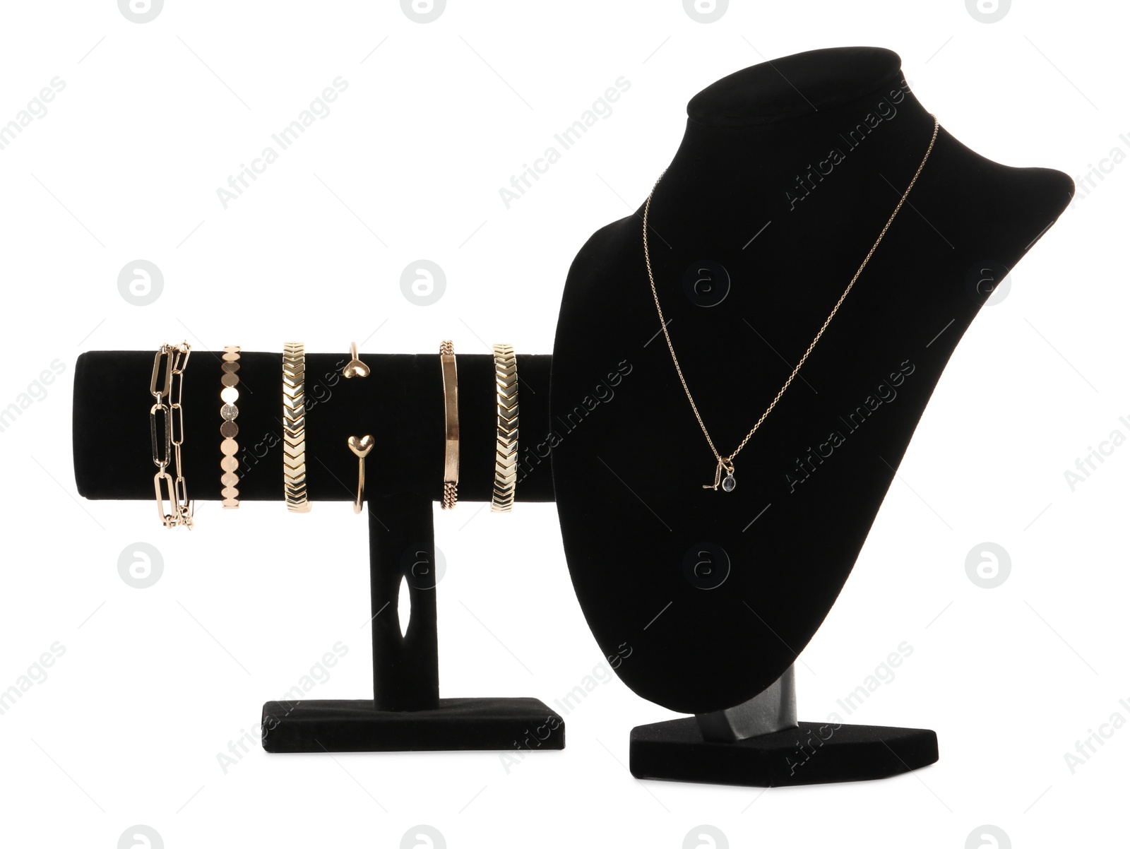 Photo of Different display stands with stylish jewelry on white background