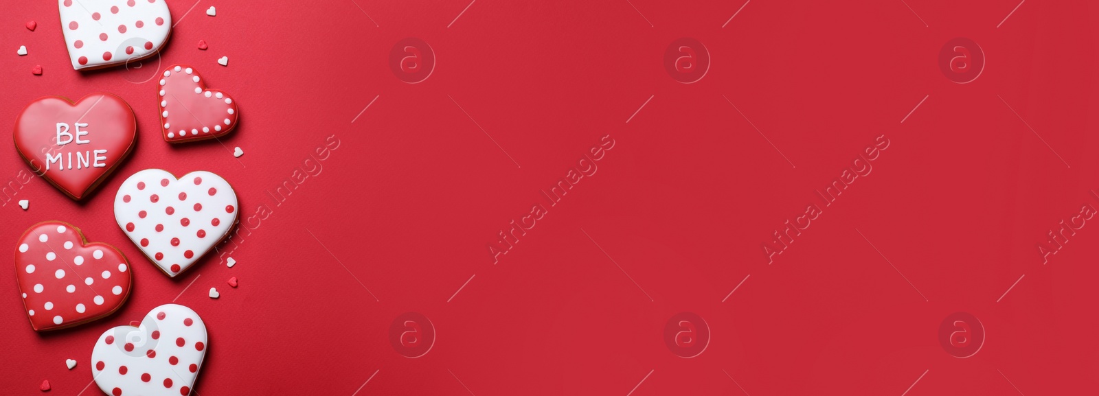 Image of Heart shaped cookies on red background, flat lay with space for text. Valentine's Day banner design