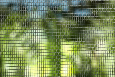 Insect screen for window against blurred background, closeup