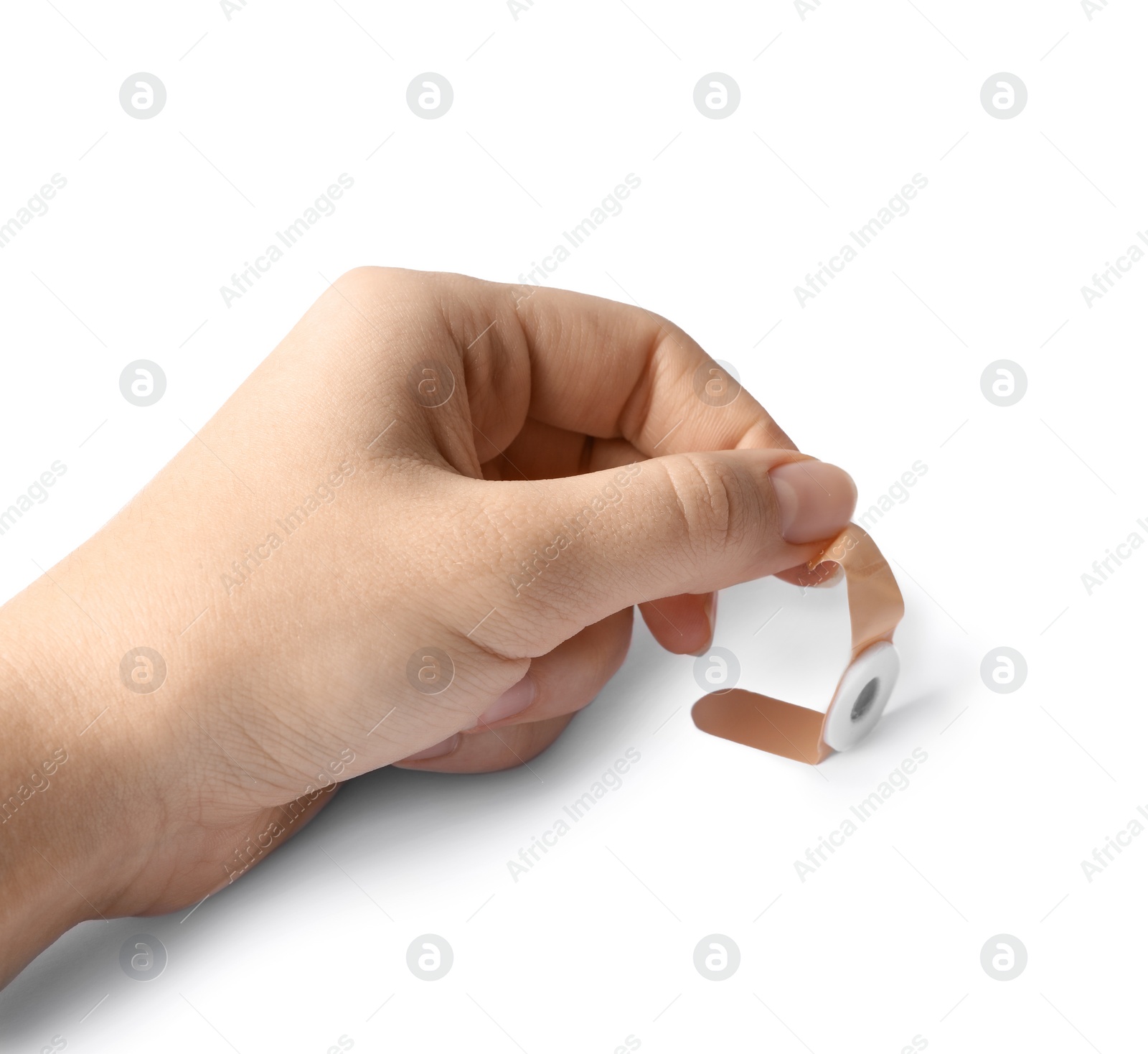Woman putting sticking plaster on white background. First aid item Photo of Woman putting sticking plaster on white background. First aid item