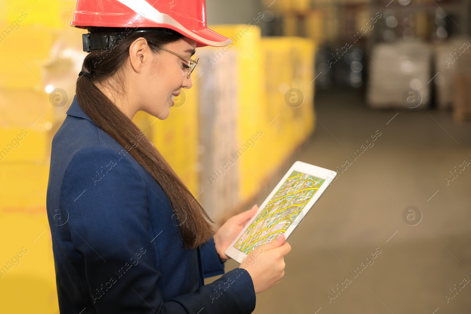 Image of Manager with tablet working at warehouse. Logistics center