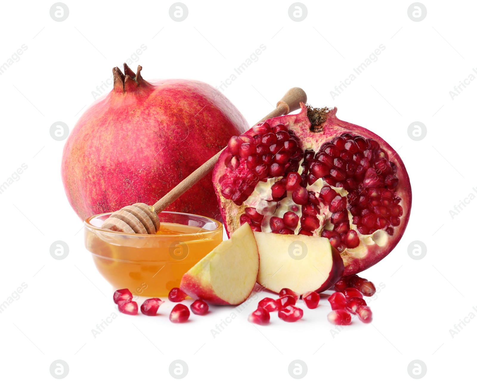 Photo of Honey, apples and pomegranate on white background. Rosh Hashanah holiday