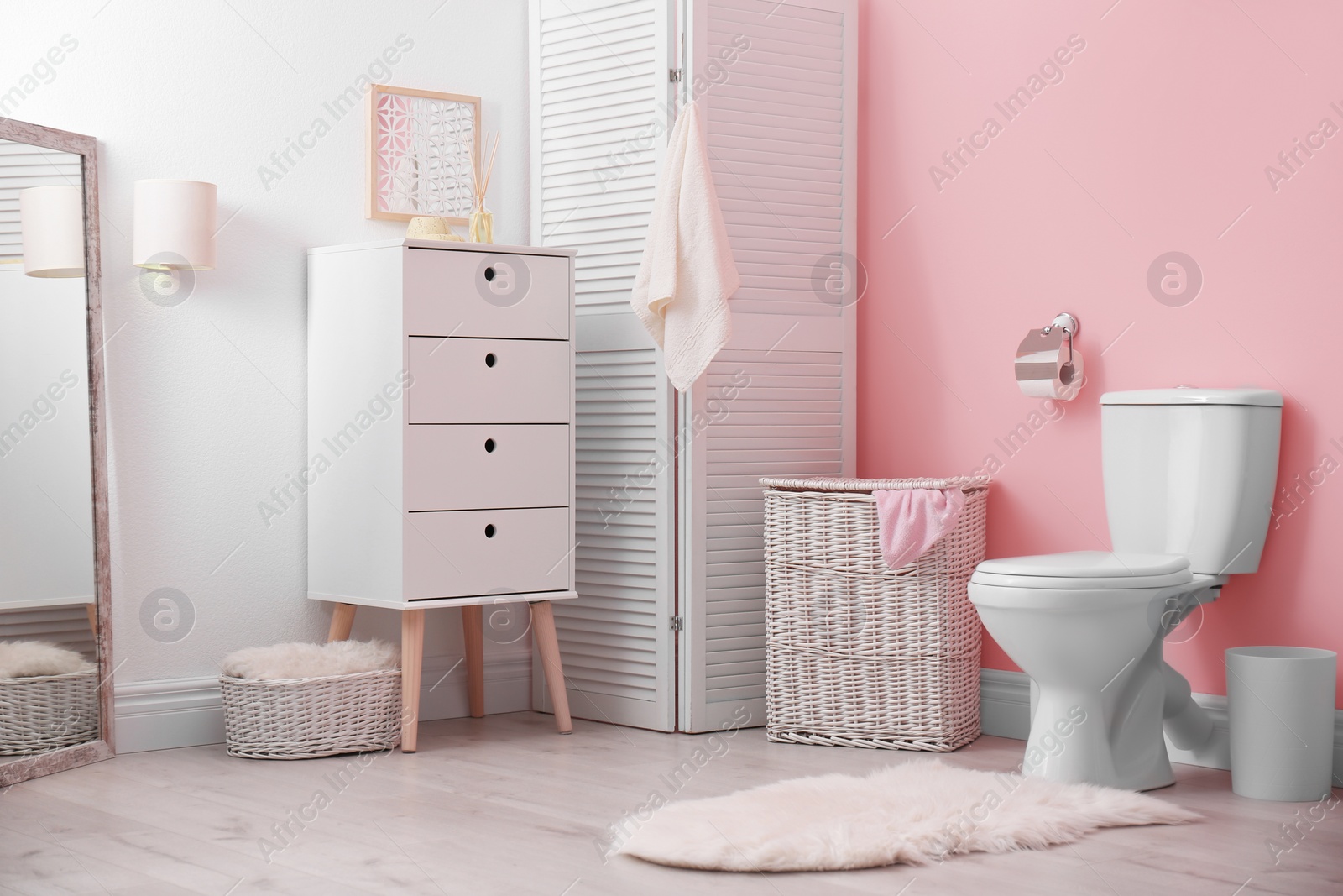 Photo of Toilet bowl in modern bathroom interior