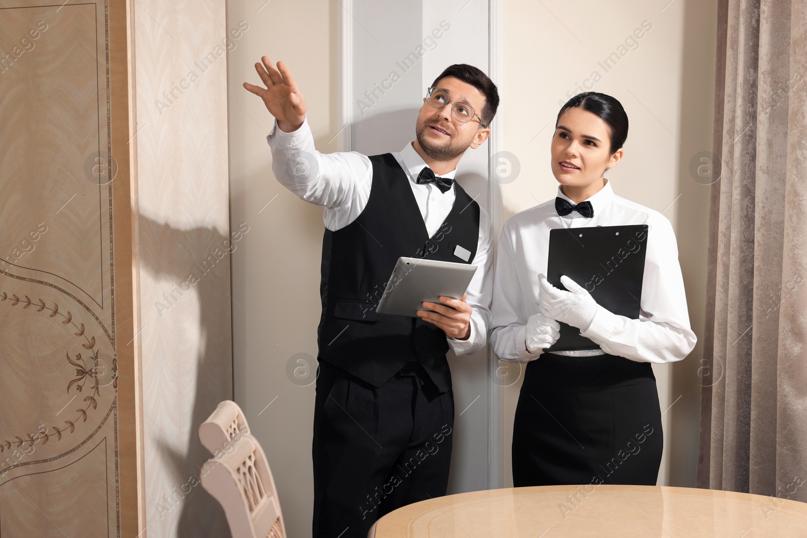 Photo of People attending professional butler courses in hotel